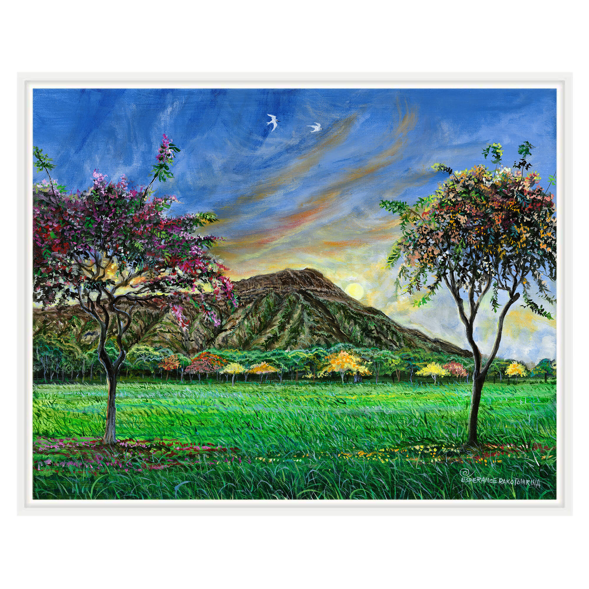 A canvas art print with white print Majestic mountains with a forest of  trees in the foreground by hawaii artist Esperance Rakotonirinaby 