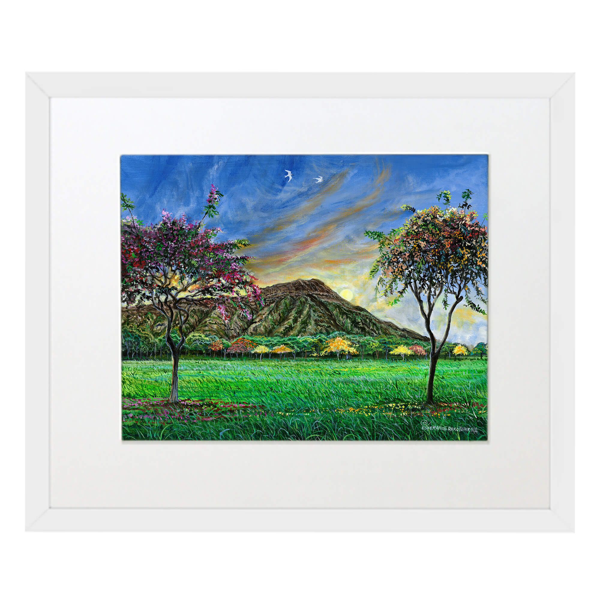 A matted art print with white frame illustrating Serene mountain landscape with trees by hawaii artist Esperance Rakotonirina