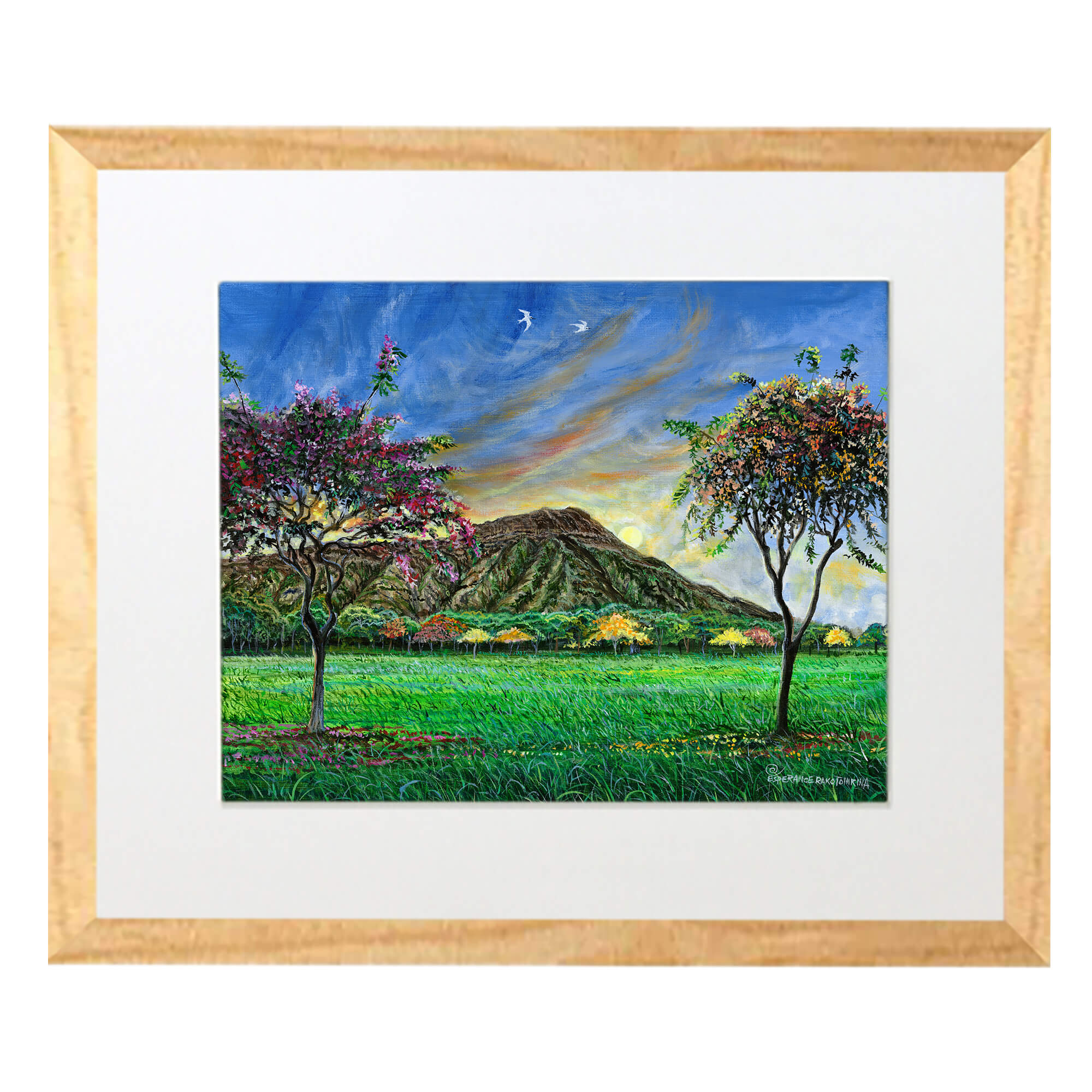 A matted art print with wood frame illustrating a Tranquil mountain scene with trees by hawaii artist Esperance Rakotonirina