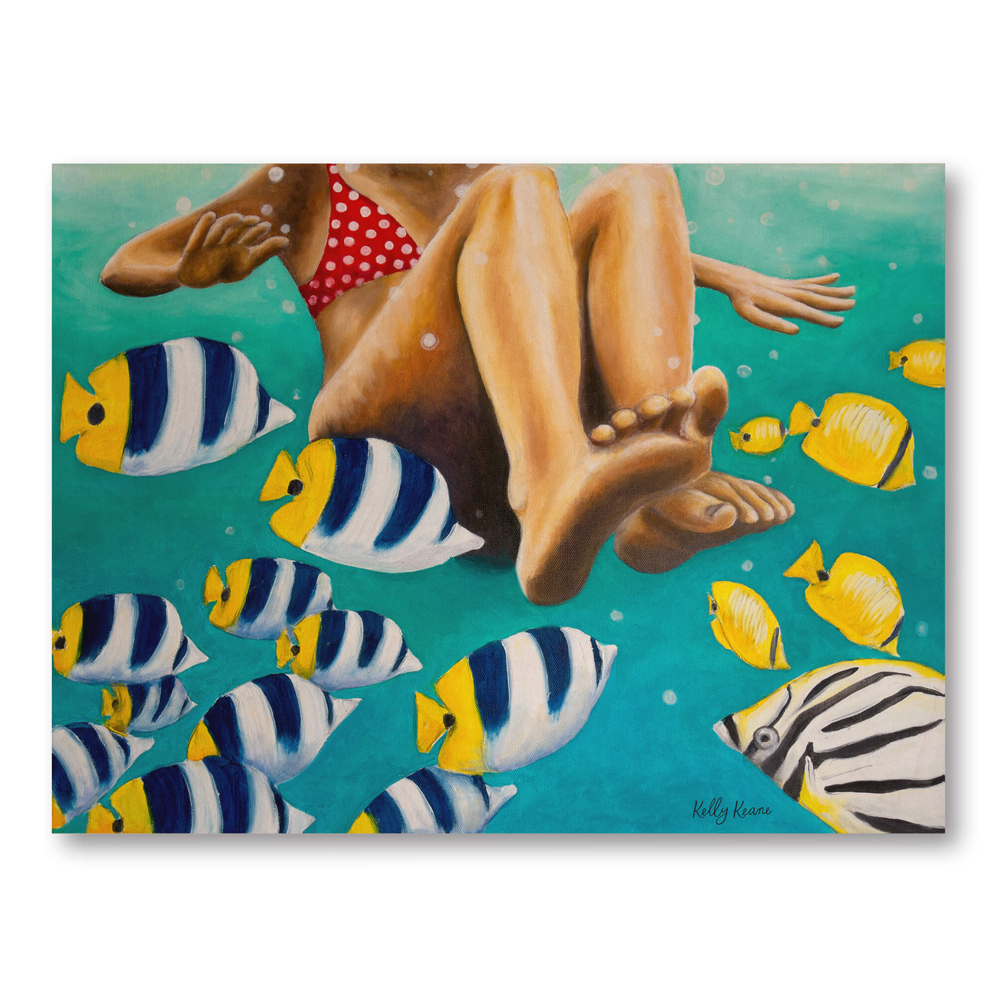 Birch wood print of a woman wearing red bikini hovering over the ocean floor with colorful fish around by Hawaii artist Kelly Keane