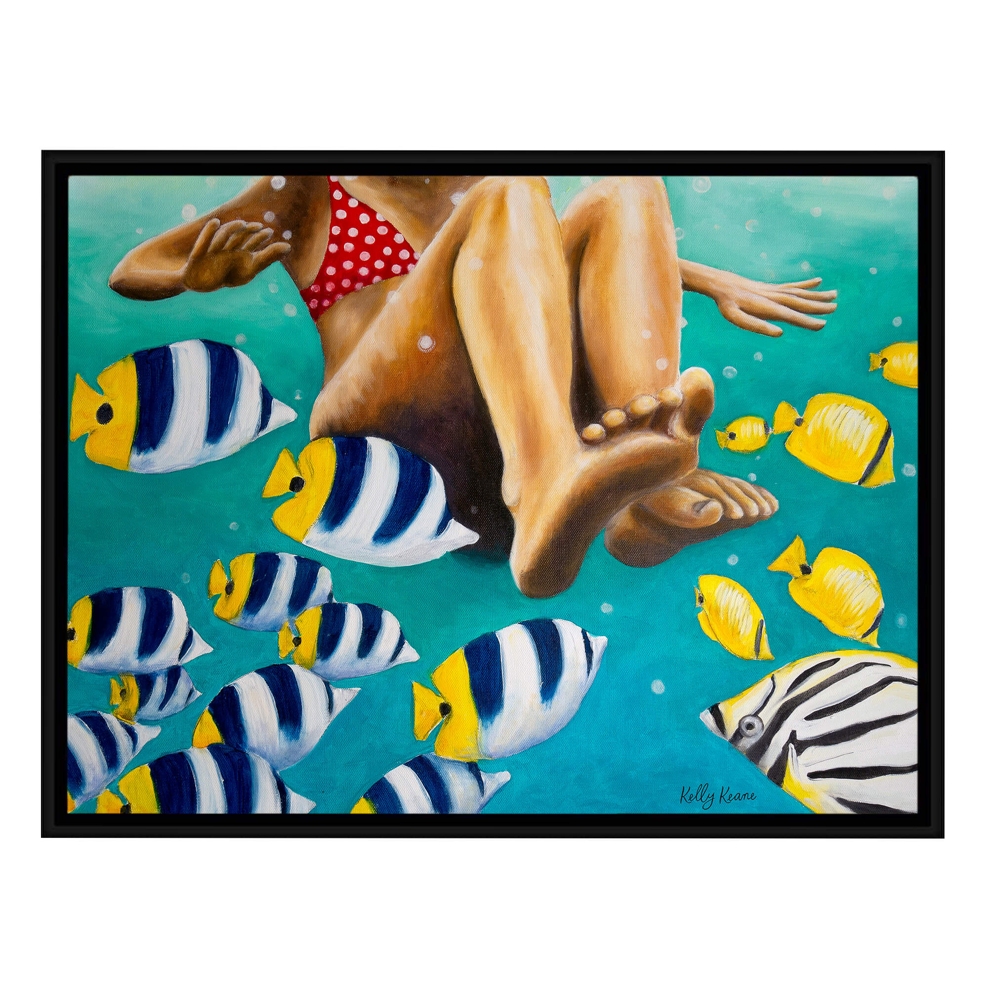 canvas art print with black frame featuring a bunch of colorful fishes in the clear water by hawaii artist Kelly Keane