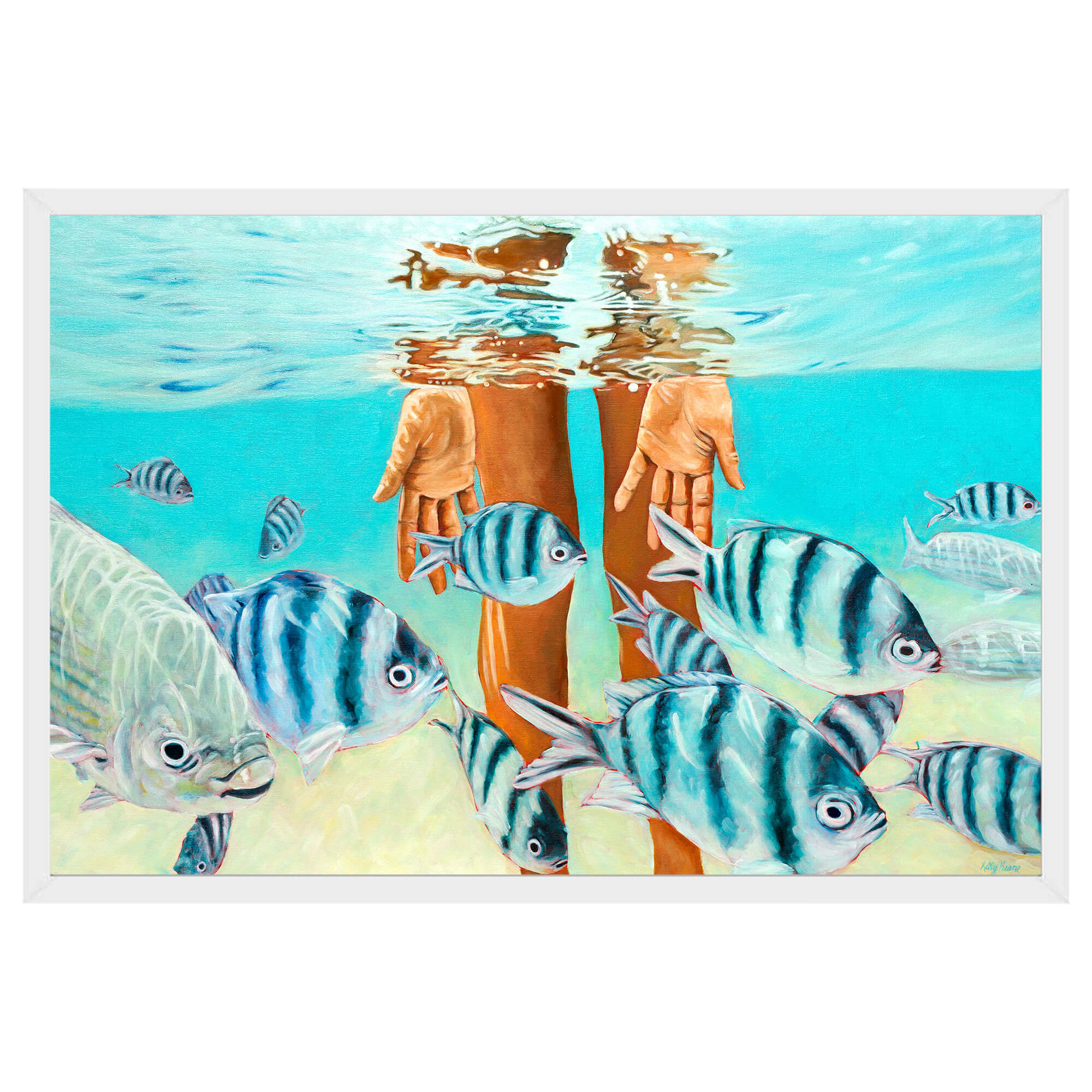 Paper art print with white frame featuring a hand submerged in the water with blue fishes  by hawaii artist Kelly Keane