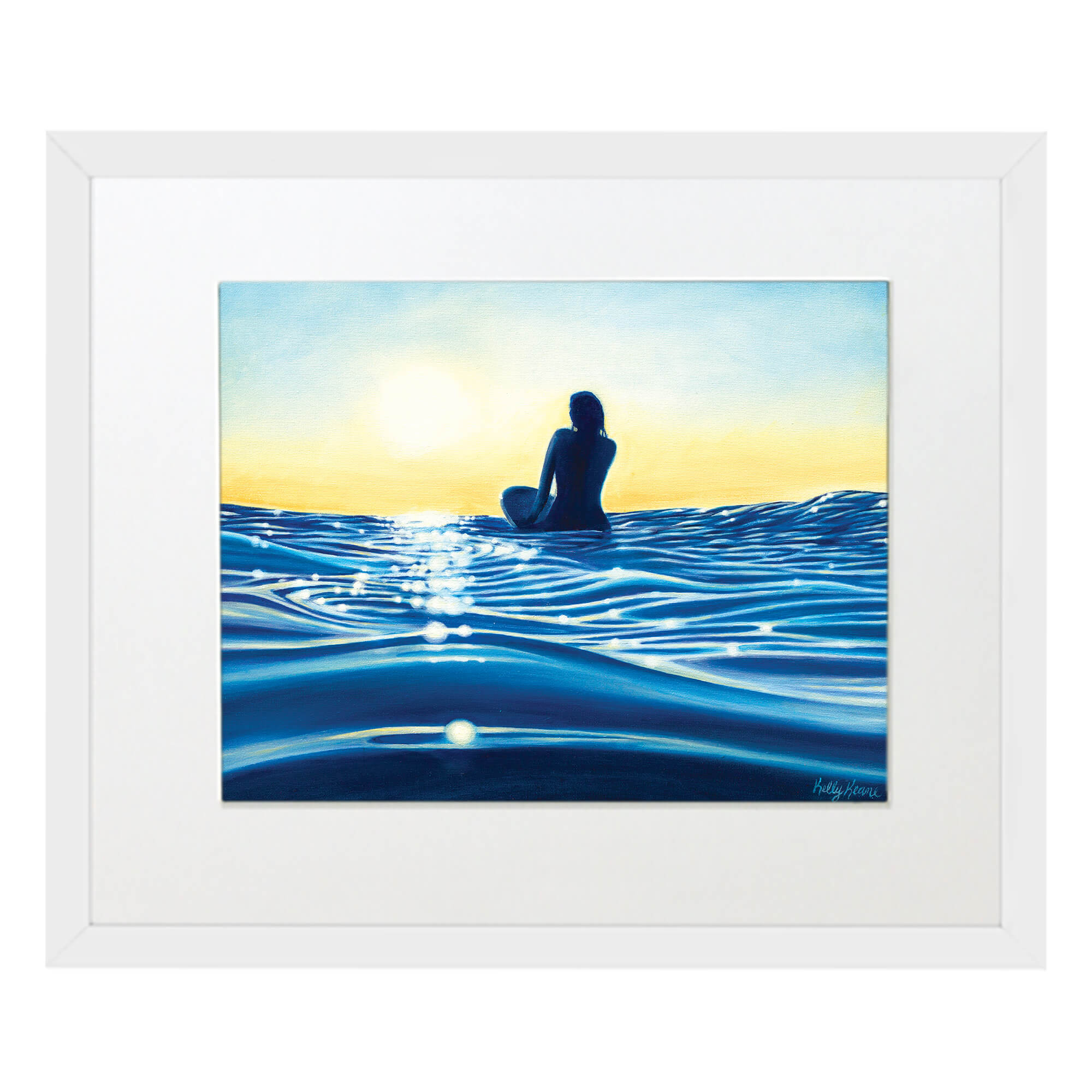 Matted art print with white frame featuring a woman surfing on the blue sea by hawaii artist Kelly Keane 