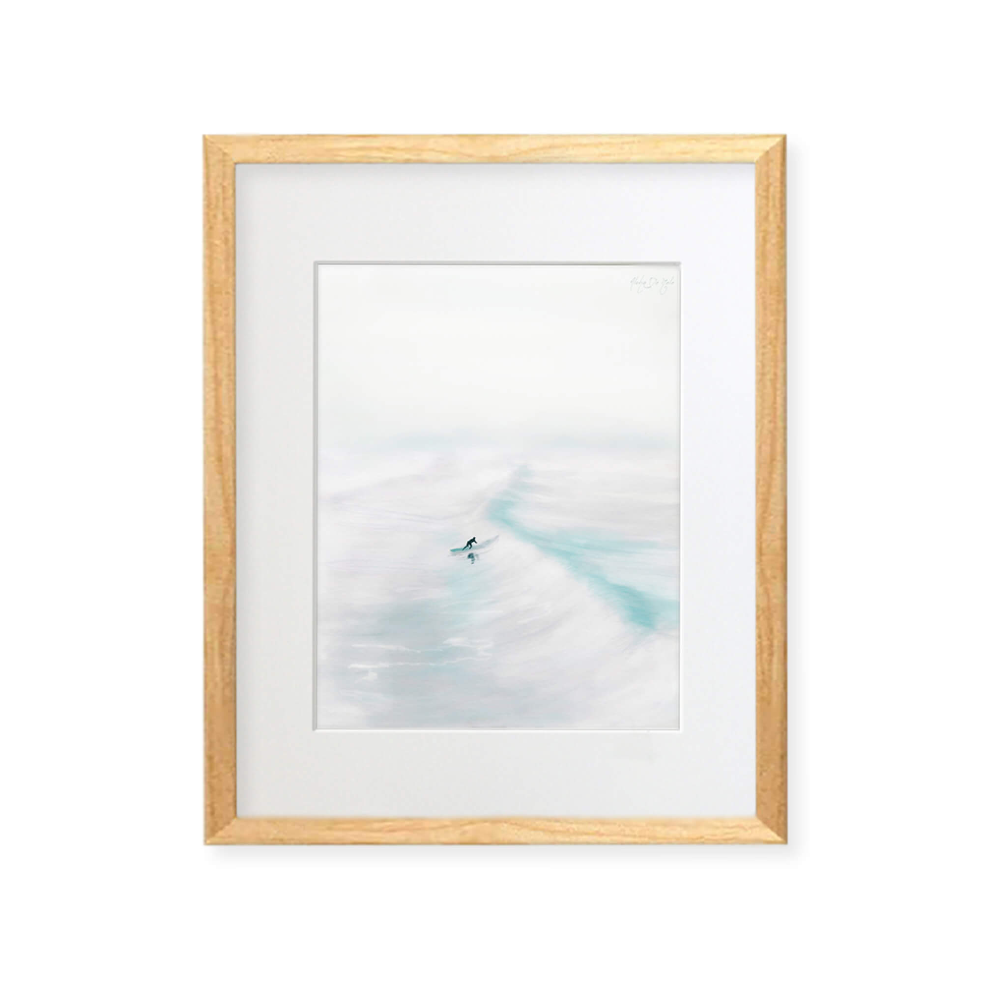 A framed matted art print of a surfer riding the epic waves of Hawaii by Hawaii artist Aloha De Mele
