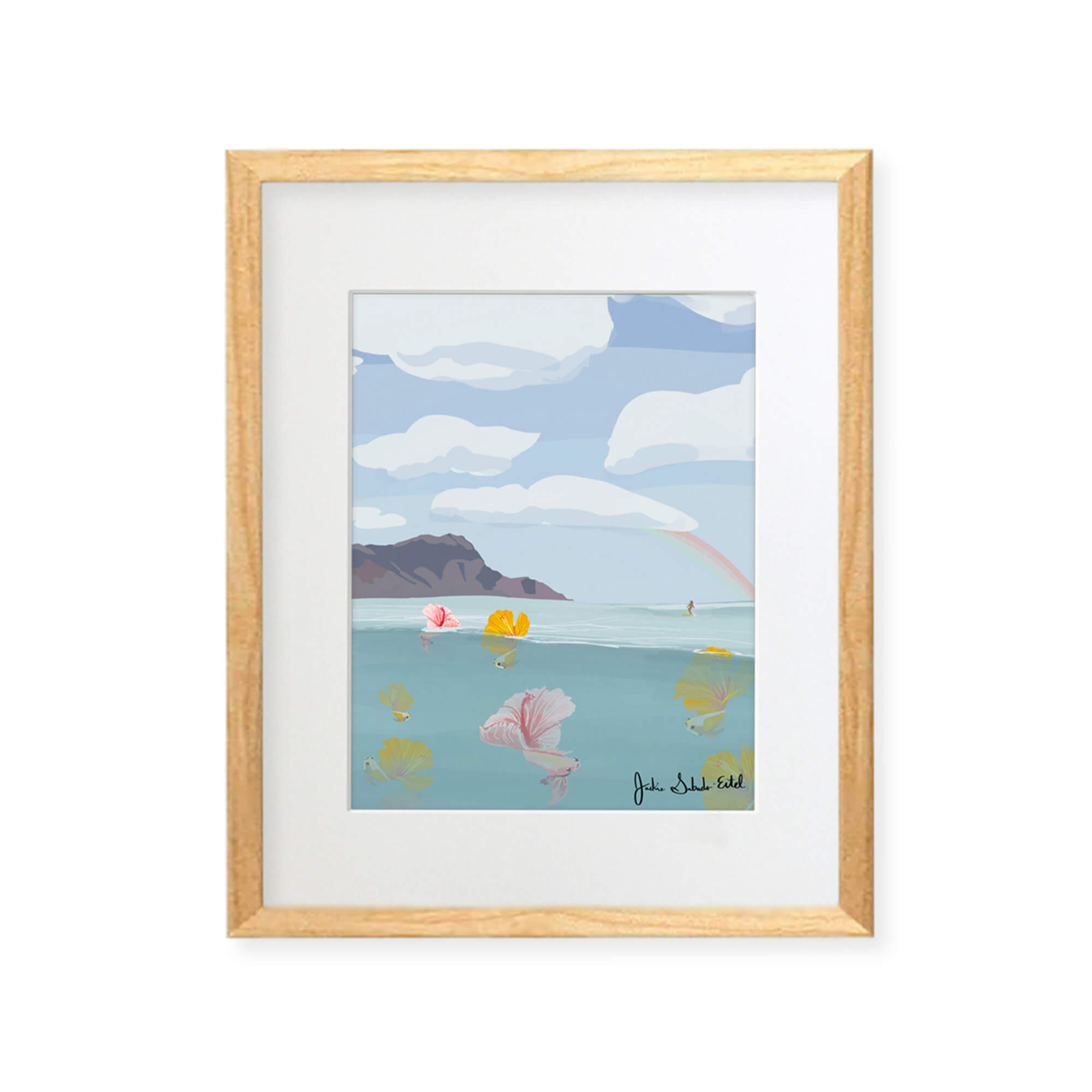 A framed matted art print featuring colorful tropical fish with hibiscus flowers as their tails, the Diamond Head in the background with a woman surfing by Hawaii artist Jackie Eitel