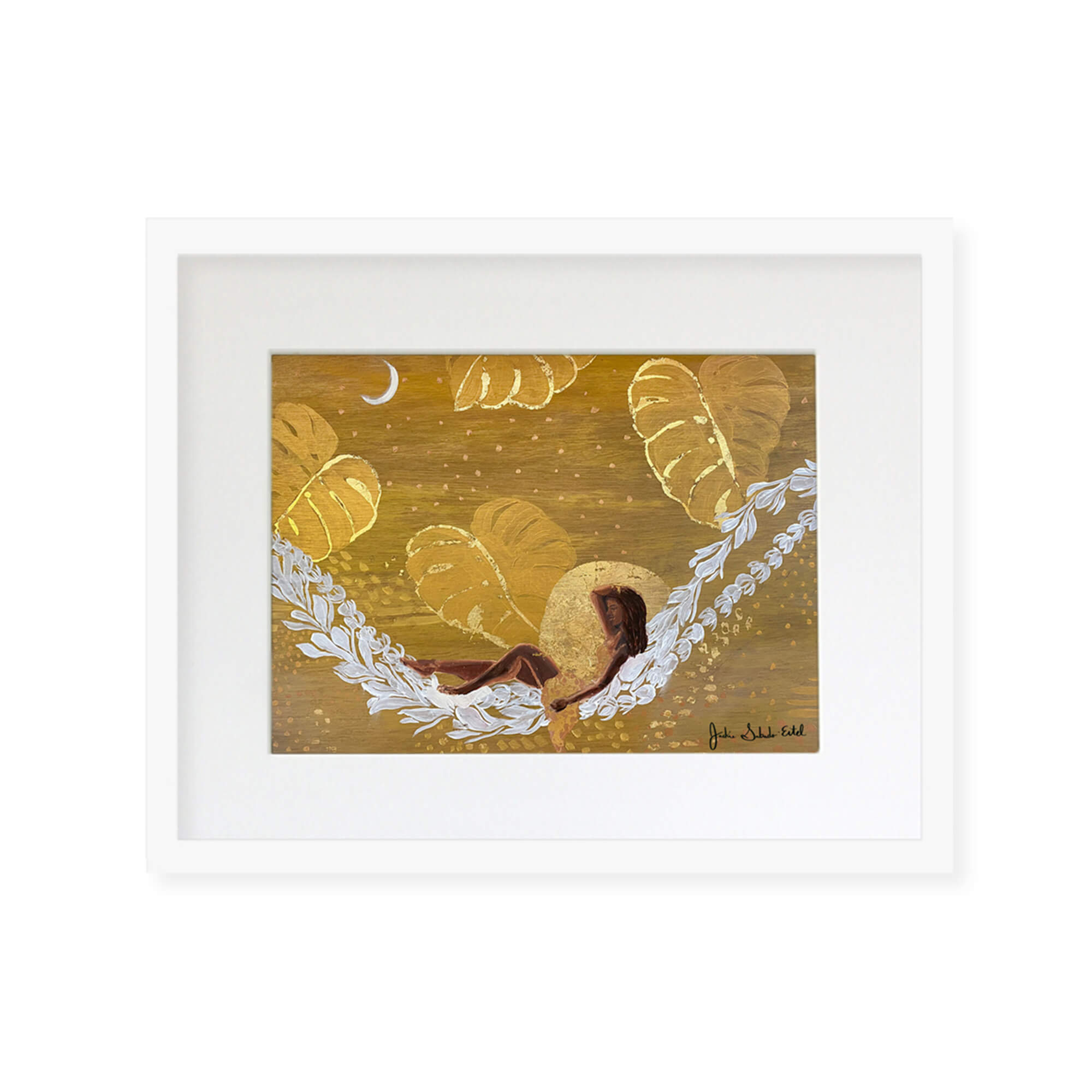 A framed matted art print featuring a woman relaxing on a lei hammock with monstera leaves backdrop and some gold touchups by Hawaii artist Jackie Eitel