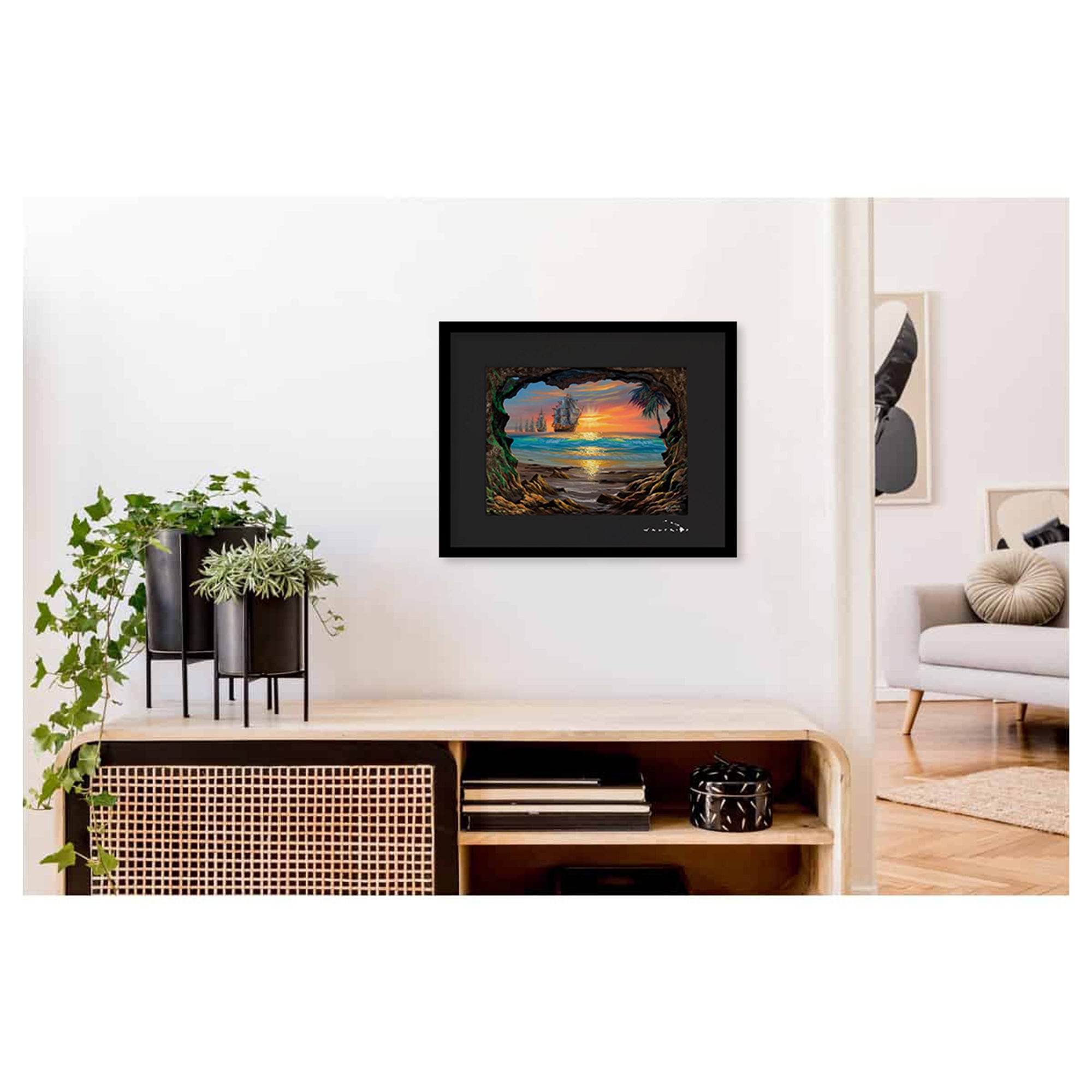 Framed matted art print featuring a cave framing vintage ships coming to the shores of Hawaii by Hawaii artist Walfrido Garcia